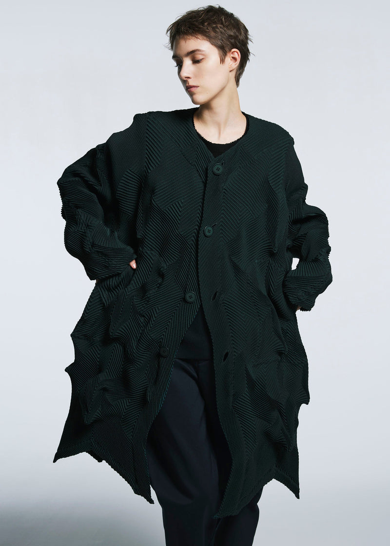 A model wears the A-POC ABLE ISSEY MIYAKE TYPE O 017 coat.