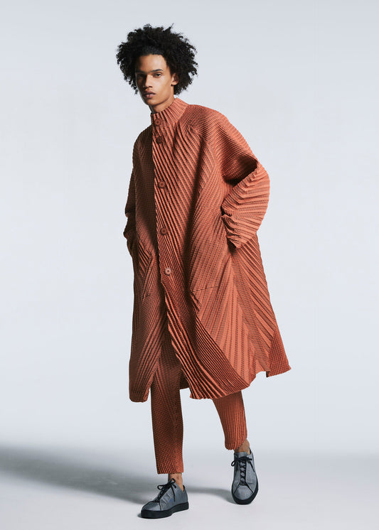 A model wears the A-POC ABLE ISSEY MIYAKE TYPE O 013 coat.