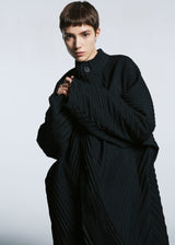 A model wears the A-POC ABLE ISSEY MIYAKE TYPE O 013 coat.