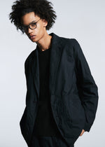 A model wears the A-POC ABLE ISSEY MIYAKE TYPE U 001 jacket.