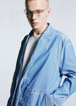 A model wears the A-POC ABLE ISSEY MIYAKE TYPE U 001 jacket.