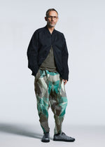 A model wears the A-POC ABLE ISSEY MIYAKE TYPE P 002 trousers.