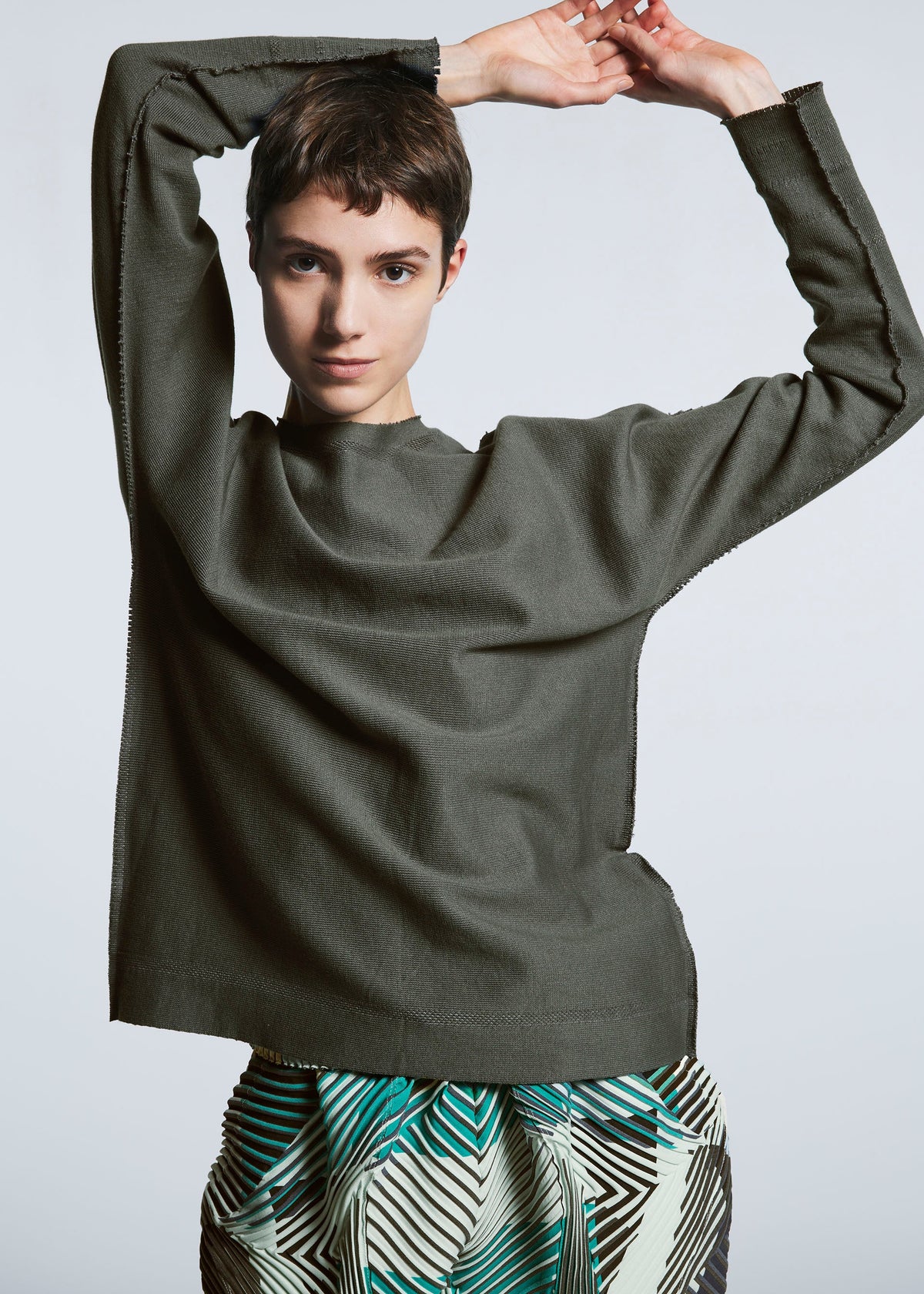 A model wears the A-POC ABLE ISSEY MIYAKE TYPE P 002 trousers.