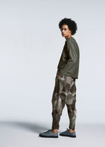 A model wears the A-POC ABLE ISSEY MIYAKE TYPE P 002 trousers.