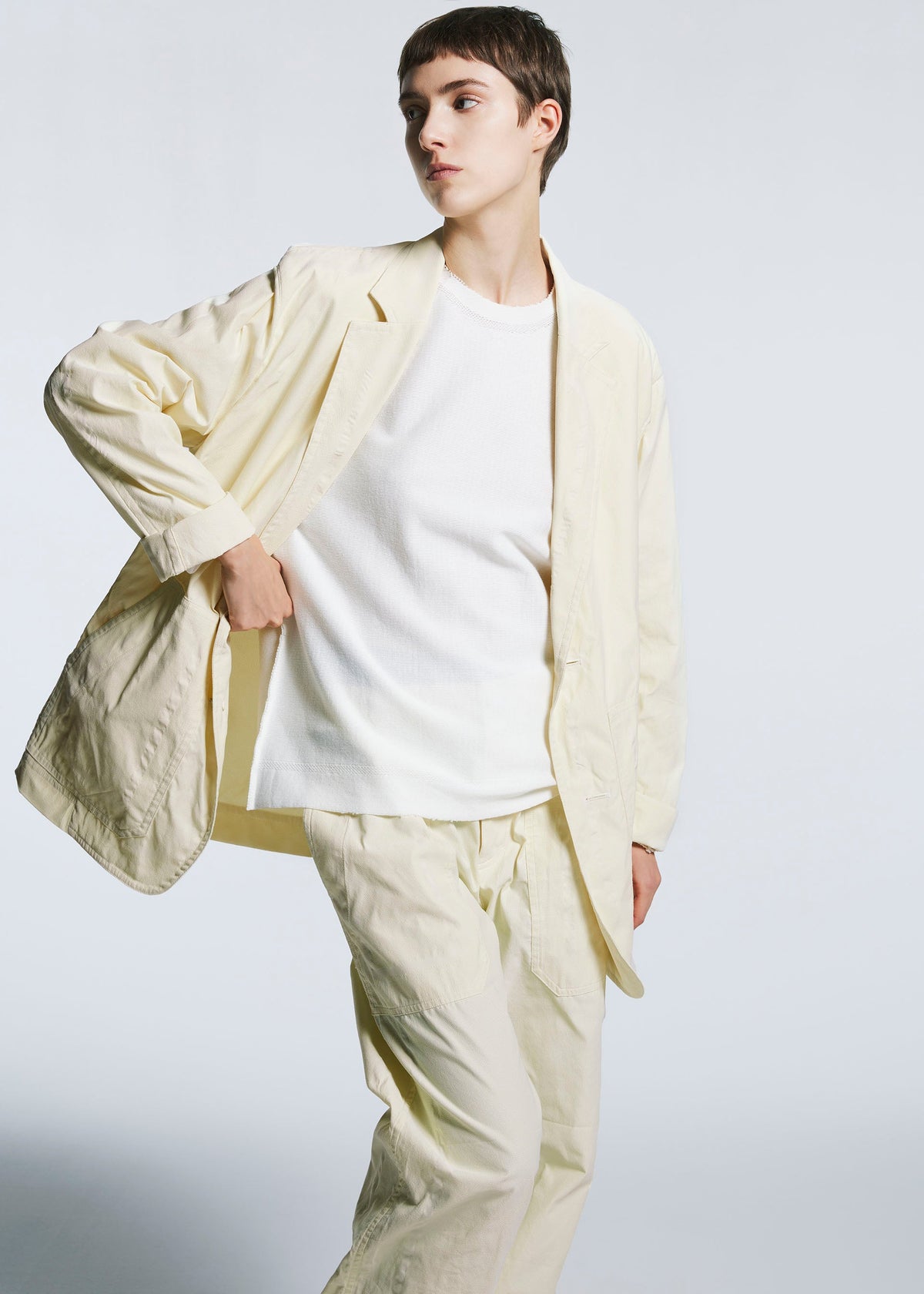 A model wears the A-POC ABLE ISSEY MIYAKE TYPE U 001 trousers.