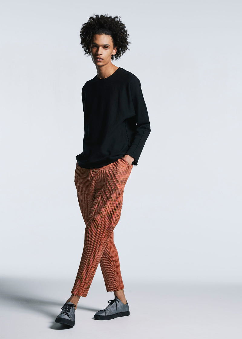 A model wears the A-POC ABLE ISSEY MIYAKE TYPE O 013 trousers.