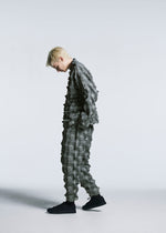 A model wears the A-POC ABLE ISSEY MIYAKE TYPE O 016 trousers.