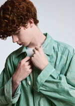 A model wears the A-POC ABLE ISSEY MIYAKE TYPE U 002 coat.