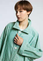 A model wears the A-POC ABLE ISSEY MIYAKE TYPE U 002 coat.