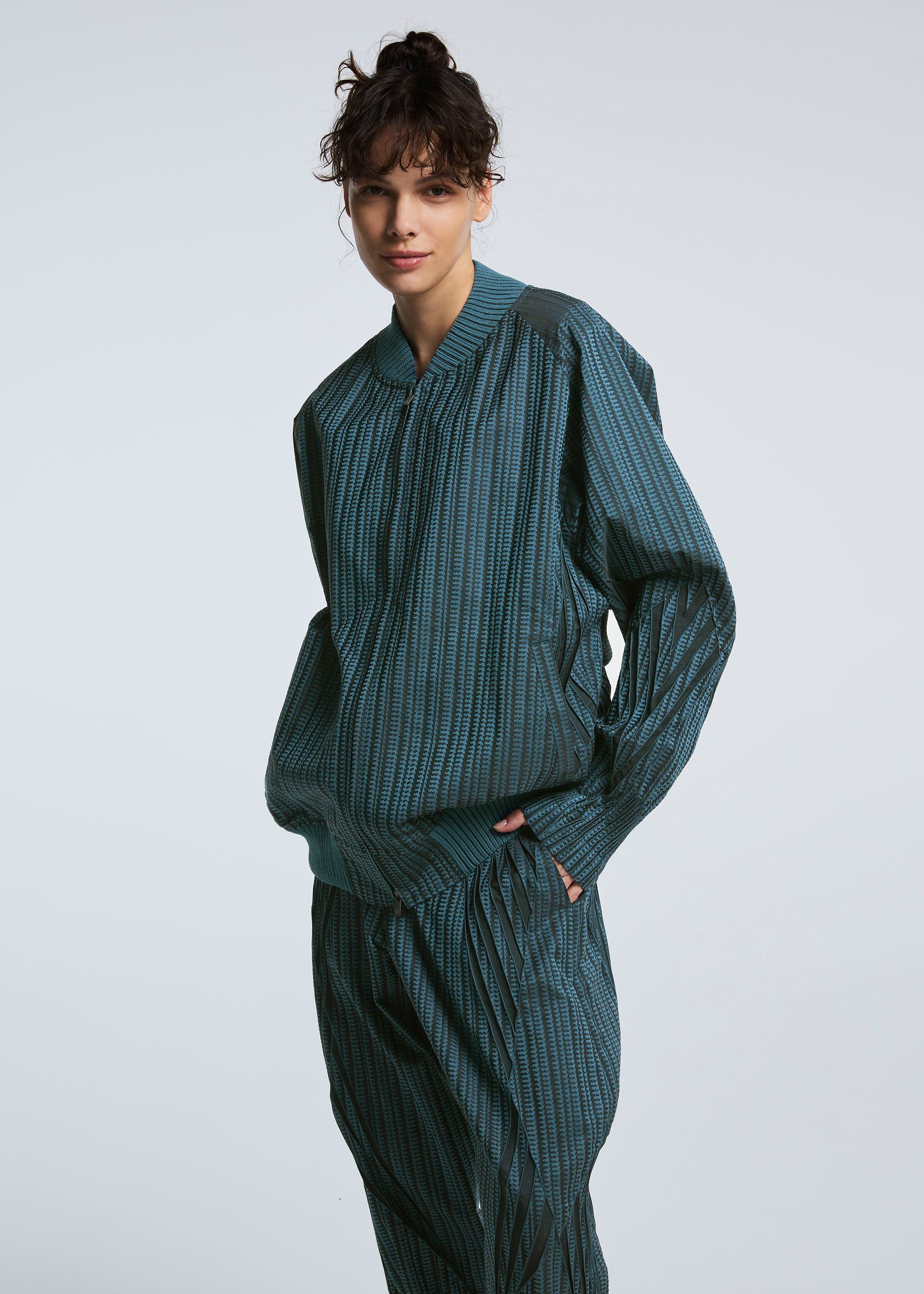 A model wears the A-POC ABLE ISSEY MIYAKE TYPE S 001 2 jacket.