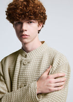 A model wears the A-POC ABLE ISSEY MIYAKE TYPE O 014 jacket.