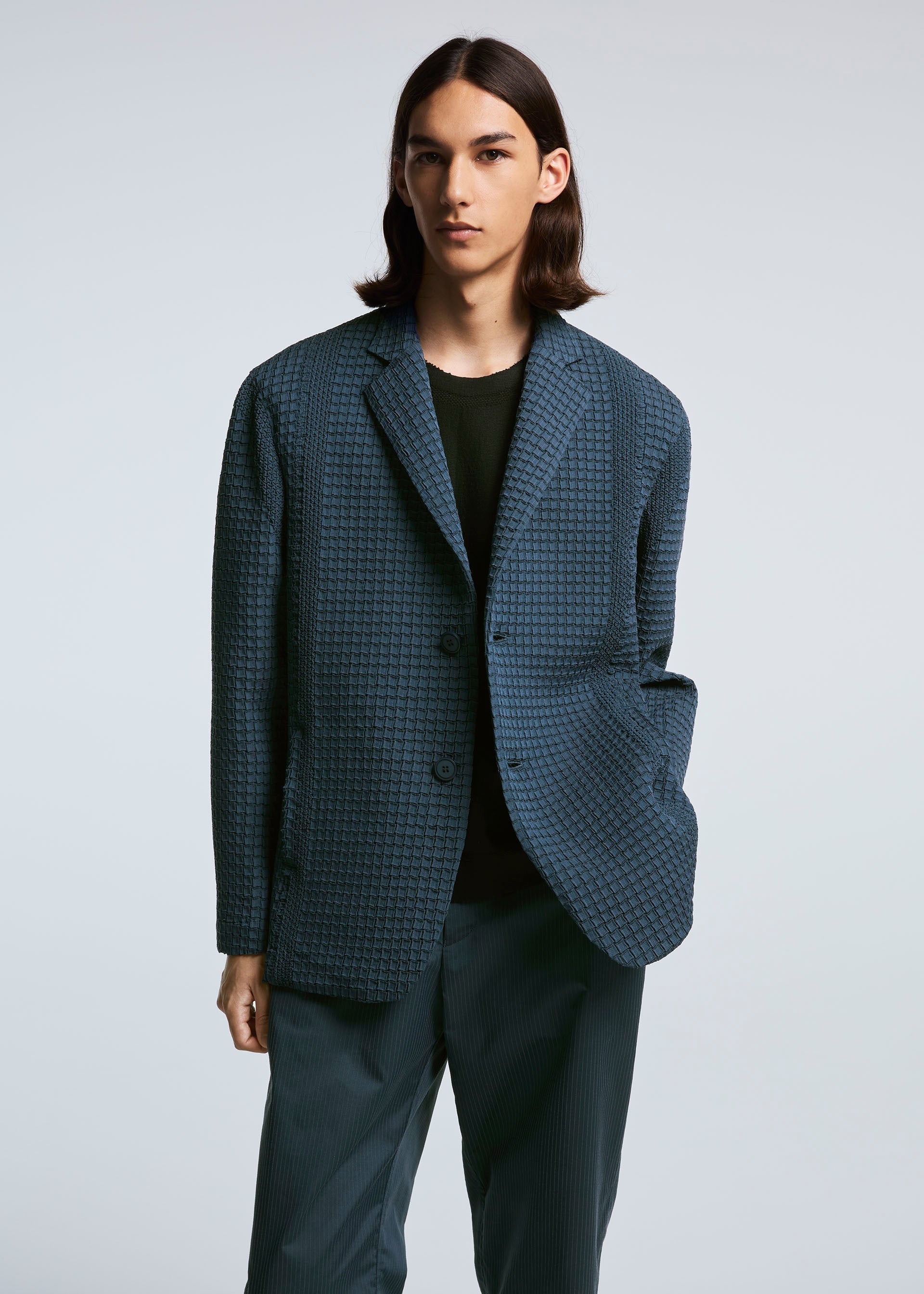 A model wears the A-POC ABLE ISSEY MIYAKE TYPE O 014 jacket.