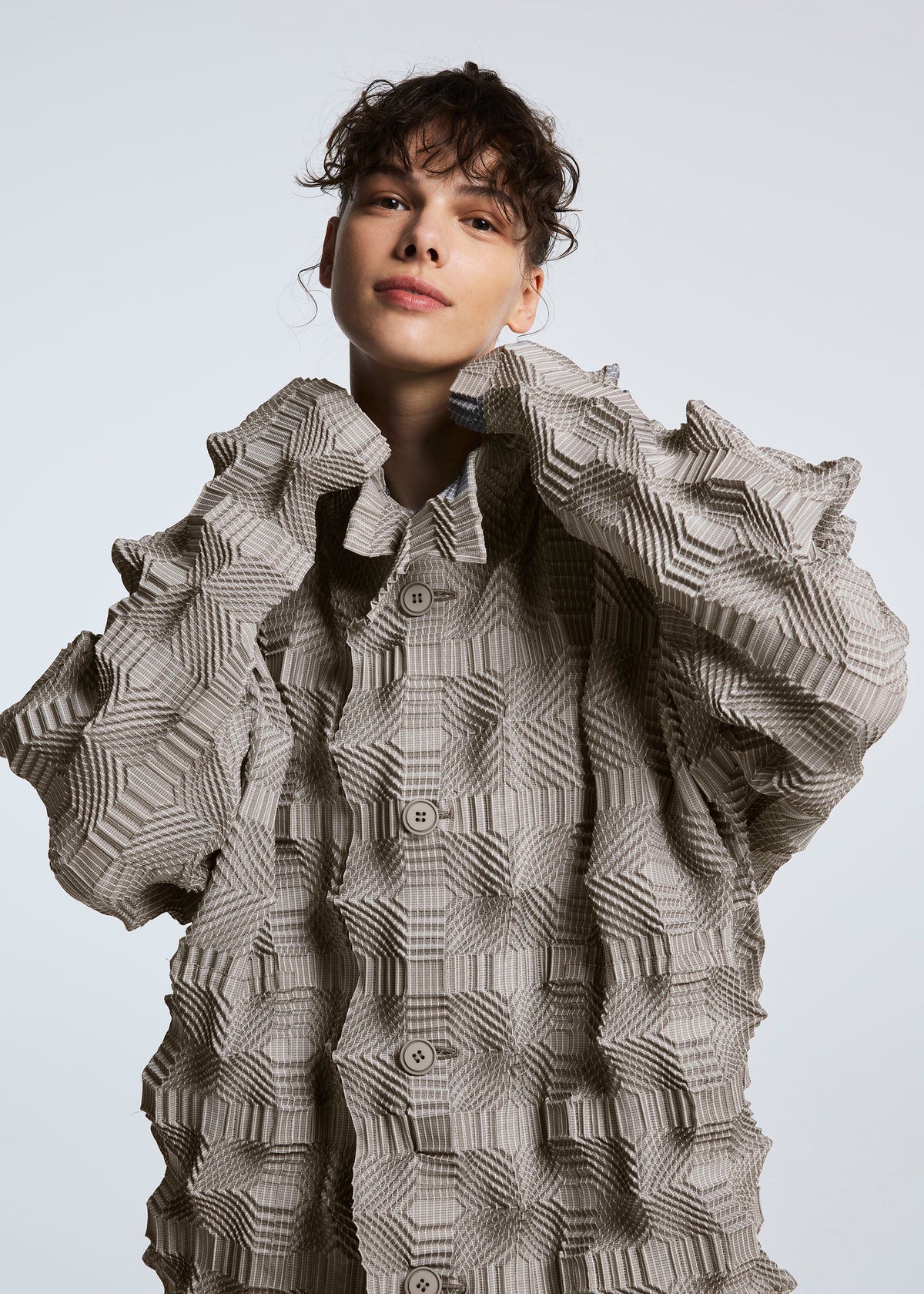 A model wears the A-POC ABLE ISSEY MIYAKE TYPE O 016 jacket.