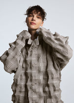 A model wears the A-POC ABLE ISSEY MIYAKE TYPE O 016 jacket.