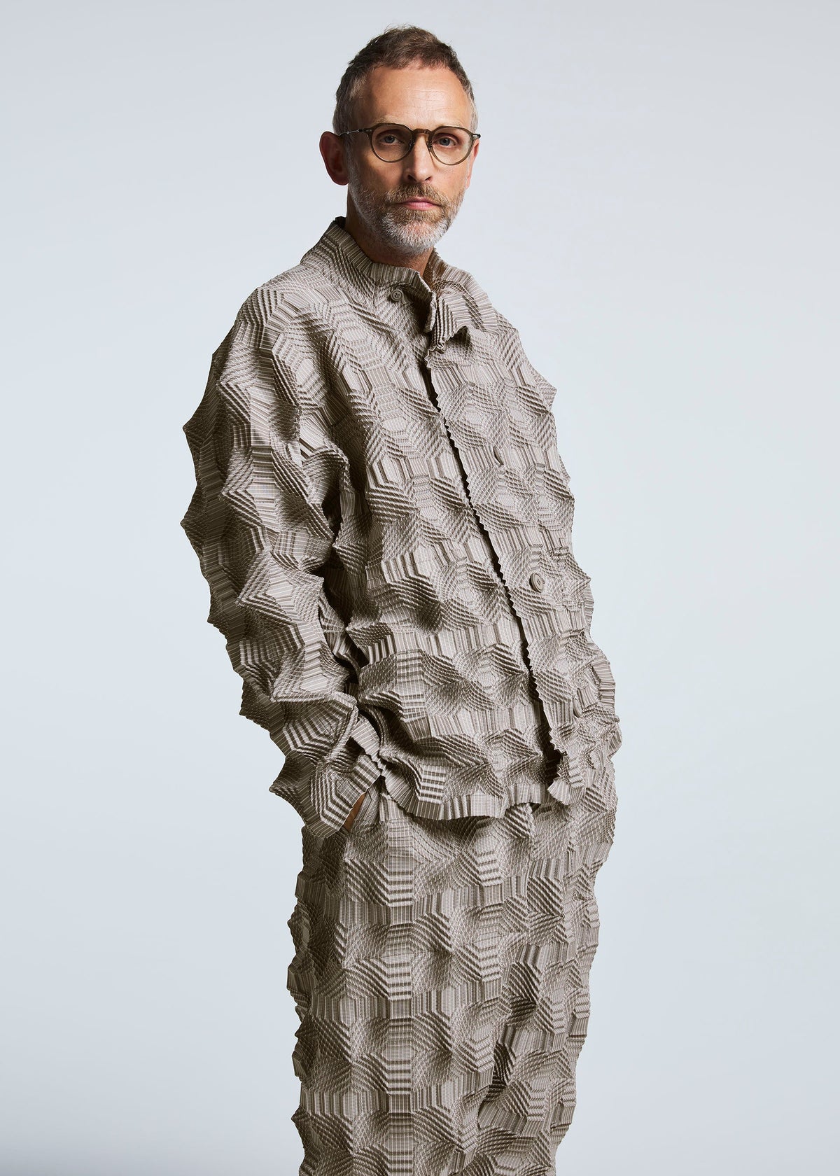A model wears the A-POC ABLE ISSEY MIYAKE TYPE O 016 trousers.