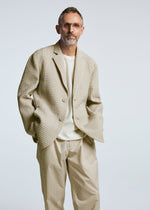 A model wears the A-POC ABLE ISSEY MIYAKE TYPE S 003 trousers.