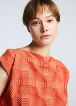 A model wears the A-POC ABLE ISSEY MIYAKE TYPE O 016 dress.