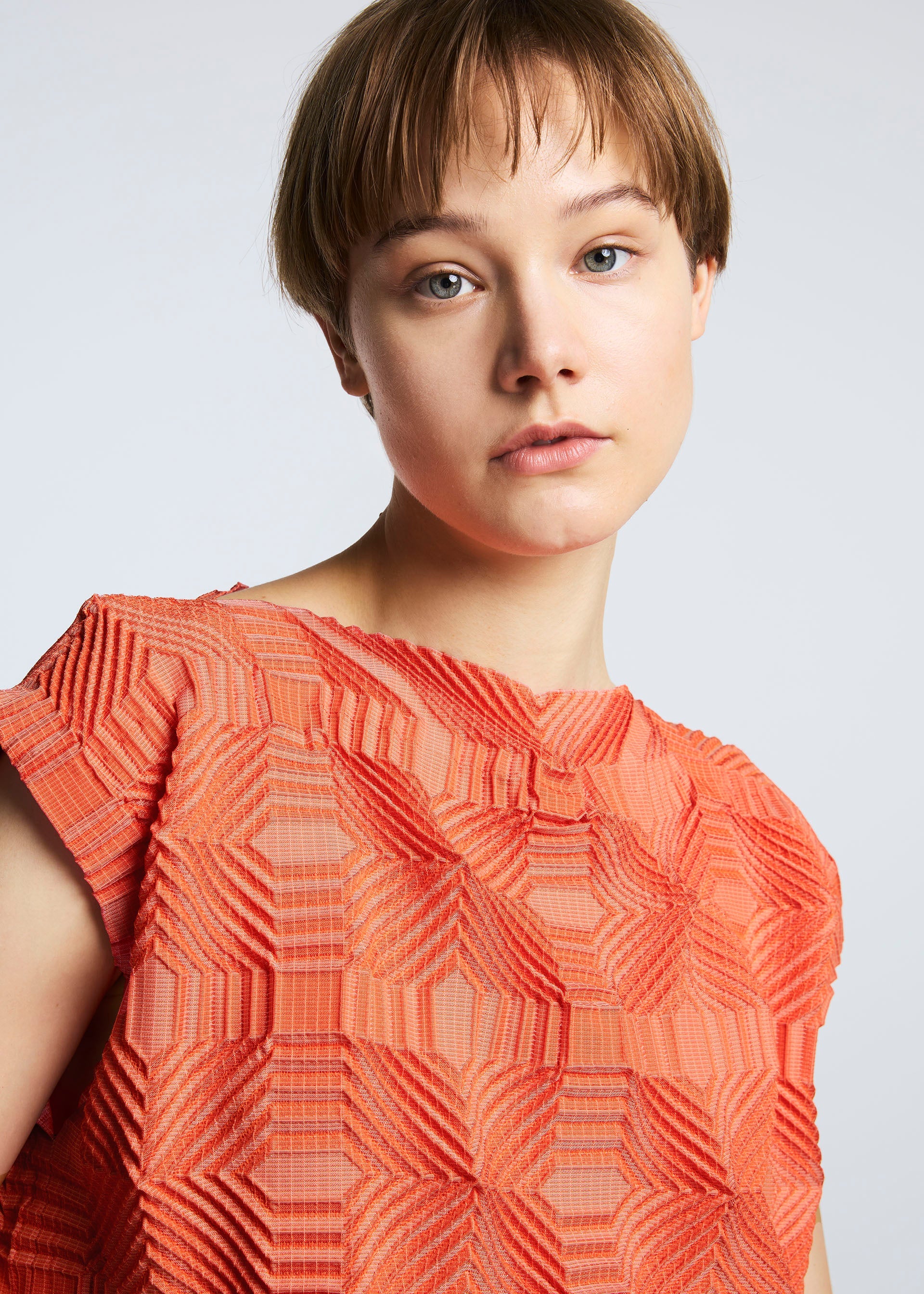 A model wears the A-POC ABLE ISSEY MIYAKE TYPE O 016 dress.