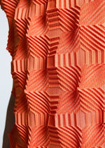 A model wears the A-POC ABLE ISSEY MIYAKE TYPE O 016 dress.