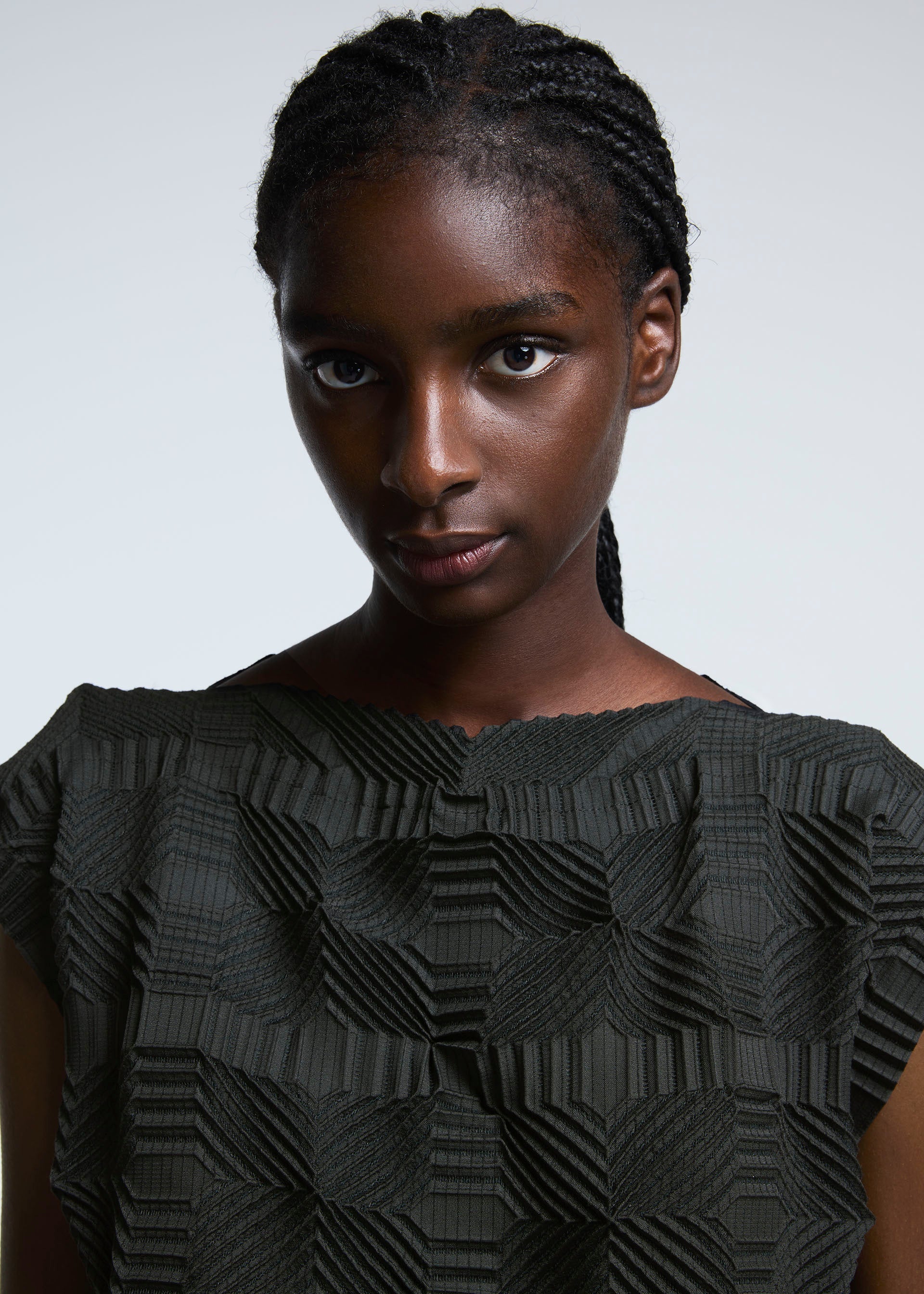 A model wears the A-POC ABLE ISSEY MIYAKE TYPE O 016 dress.