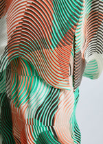 A model wears the A-POC ABLE ISSEY MIYAKE TYPE P 001 top.