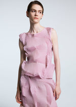 A model wears the A-POC ABLE ISSEY MIYAKE TYPE O 003 shirt.