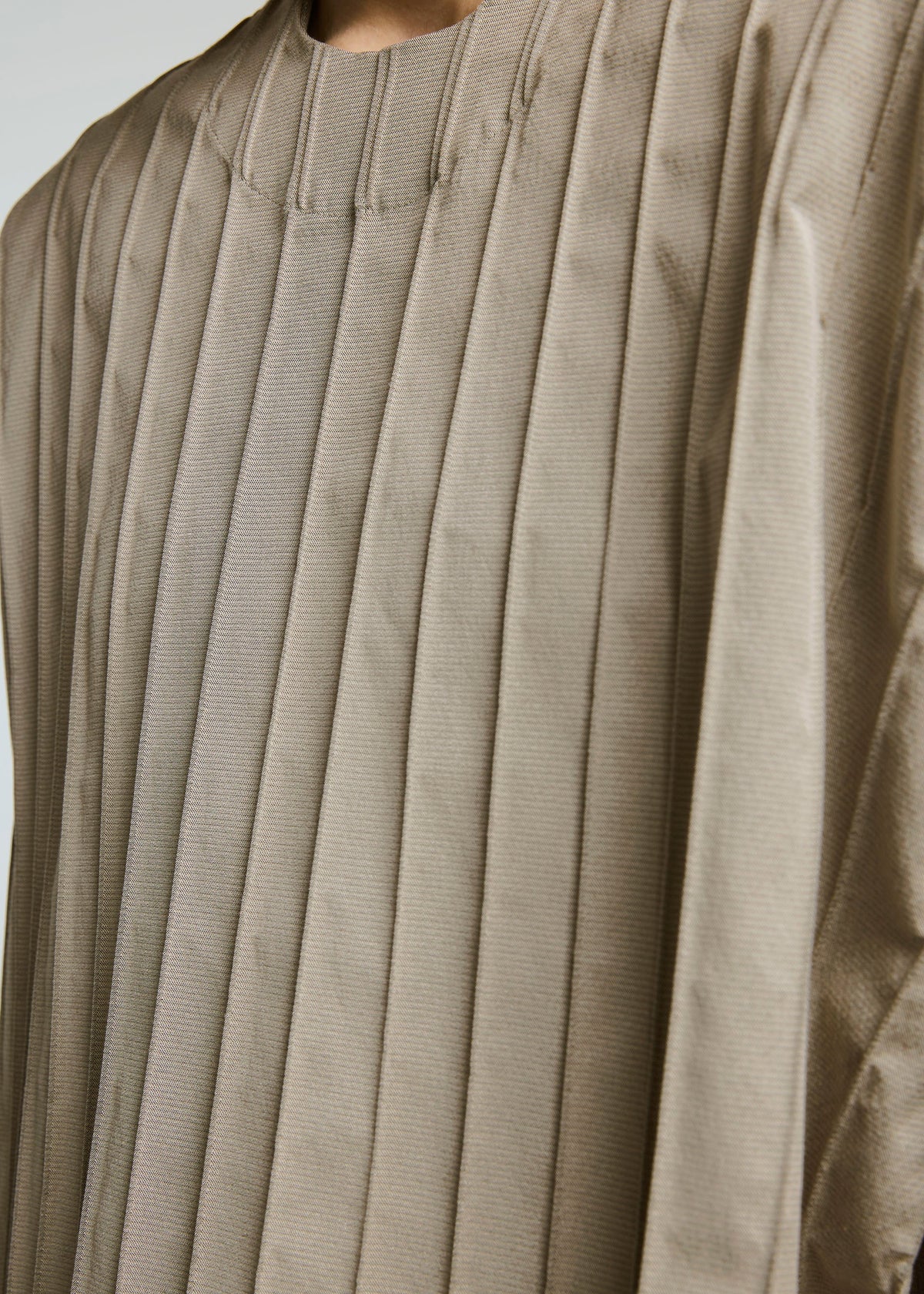 A model wears the A-POC ABLE ISSEY MIYAKE TYPE W 007 2 top.