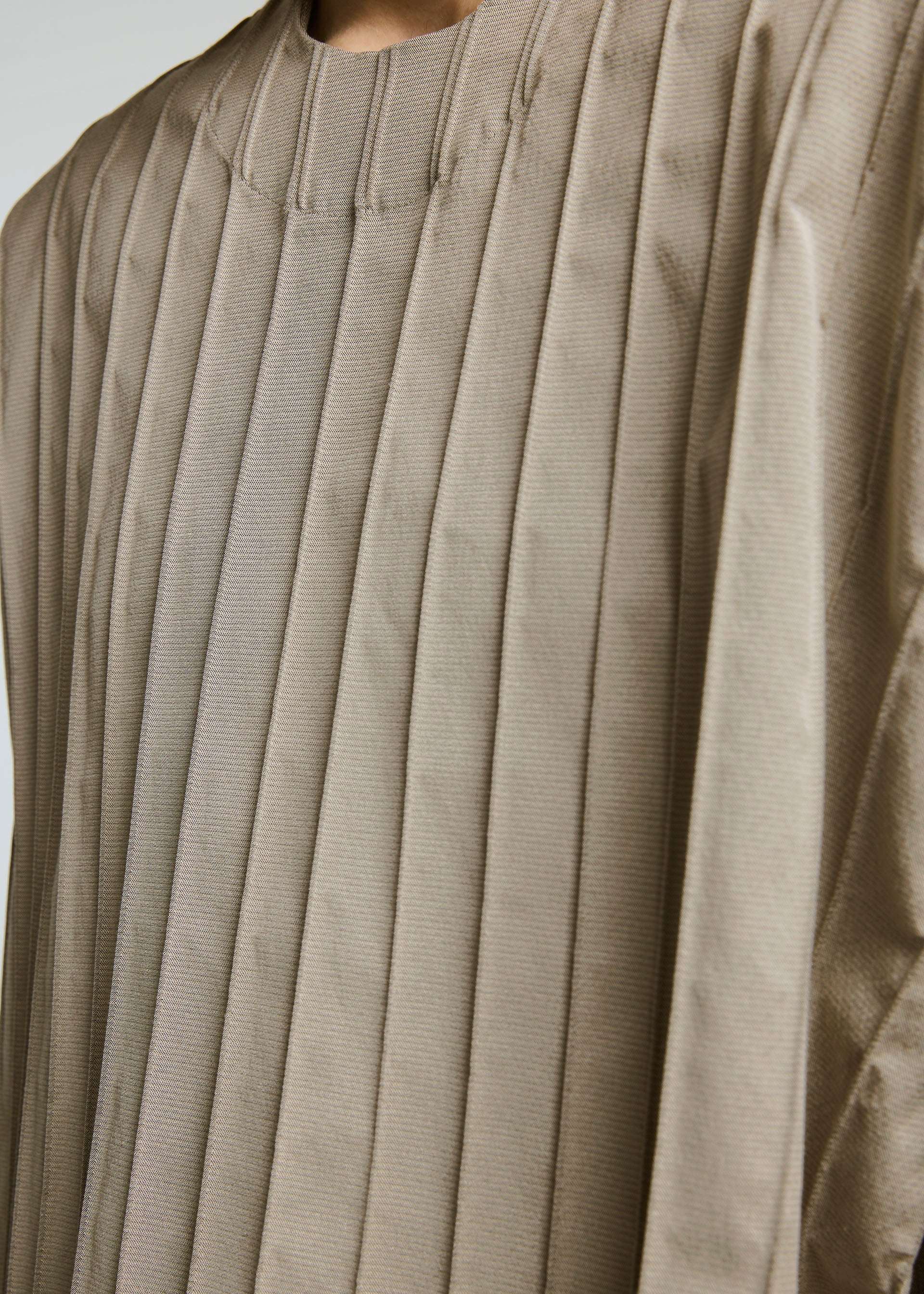 A model wears the A-POC ABLE ISSEY MIYAKE TYPE W 007 2 top.