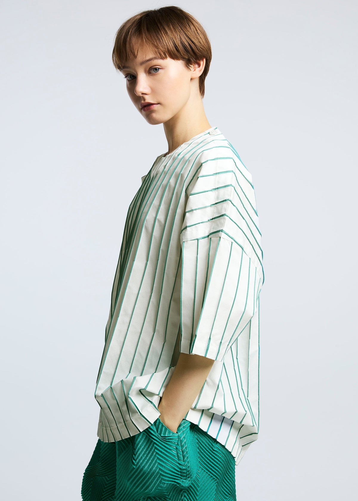 A model wears the A-POC ABLE ISSEY MIYAKE TYPE W 007 1 shirt.