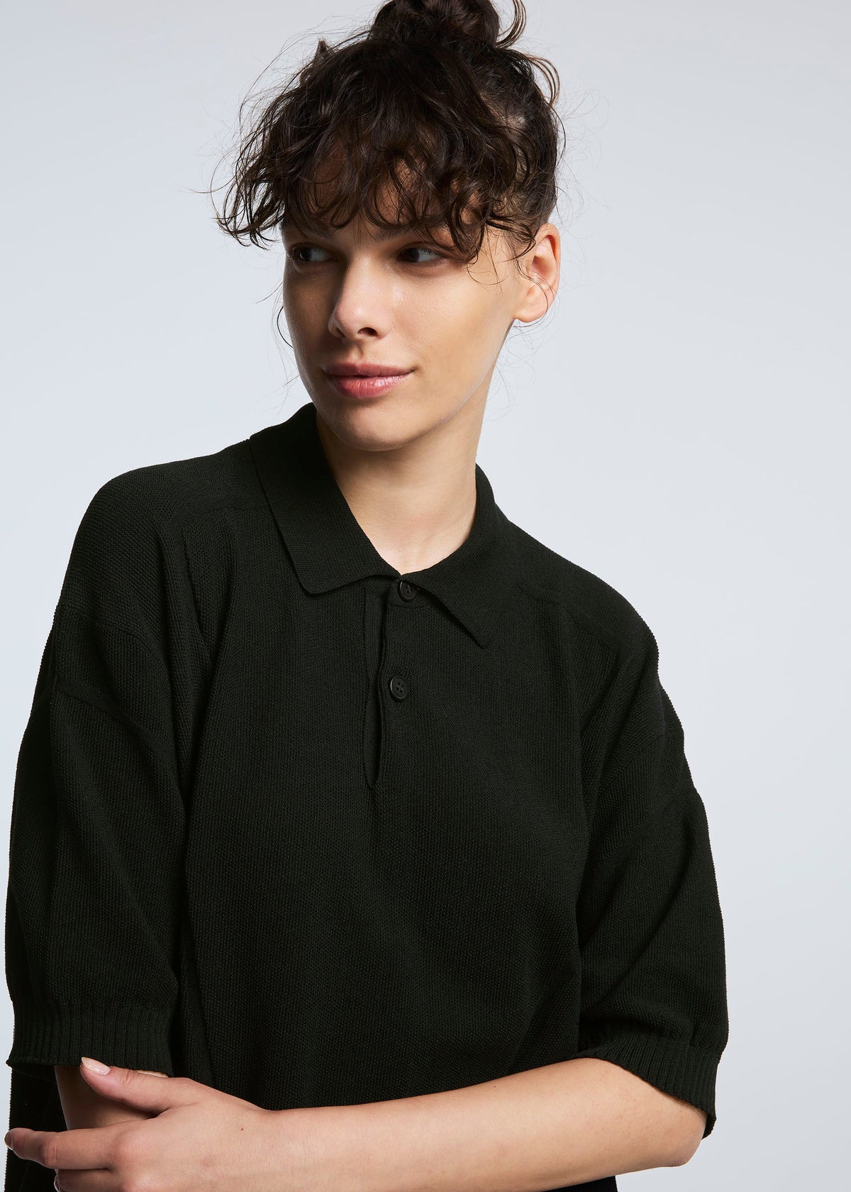 A model wears the A-POC ABLE ISSEY MIYAKE TYPE K 003 3 top.