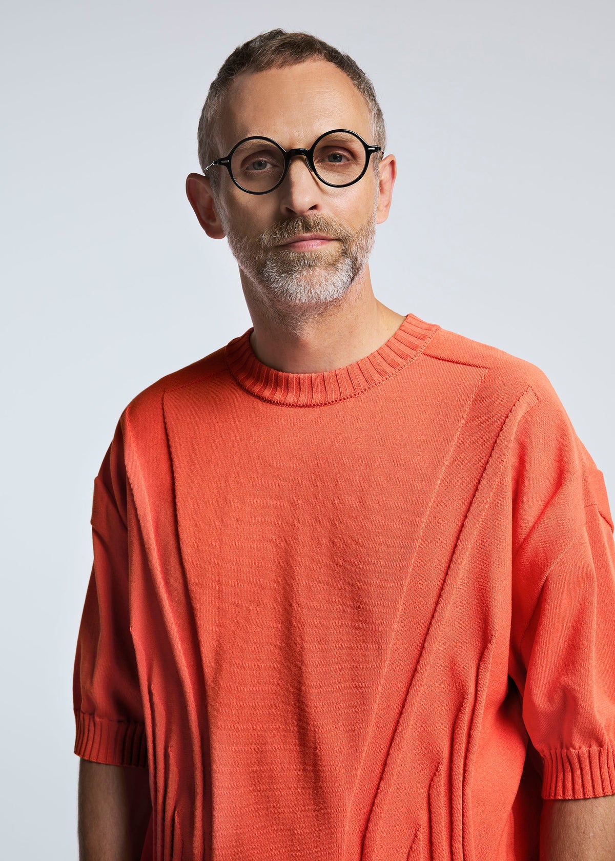 A model wears the A-POC ABLE ISSEY MIYAKE TYPE K 003 4 top.