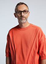 A model wears the A-POC ABLE ISSEY MIYAKE TYPE K 003 4 top.