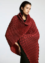 A model wears the A-POC ABLE ISSEY MIYAKE TYPE O STOLE accessories.