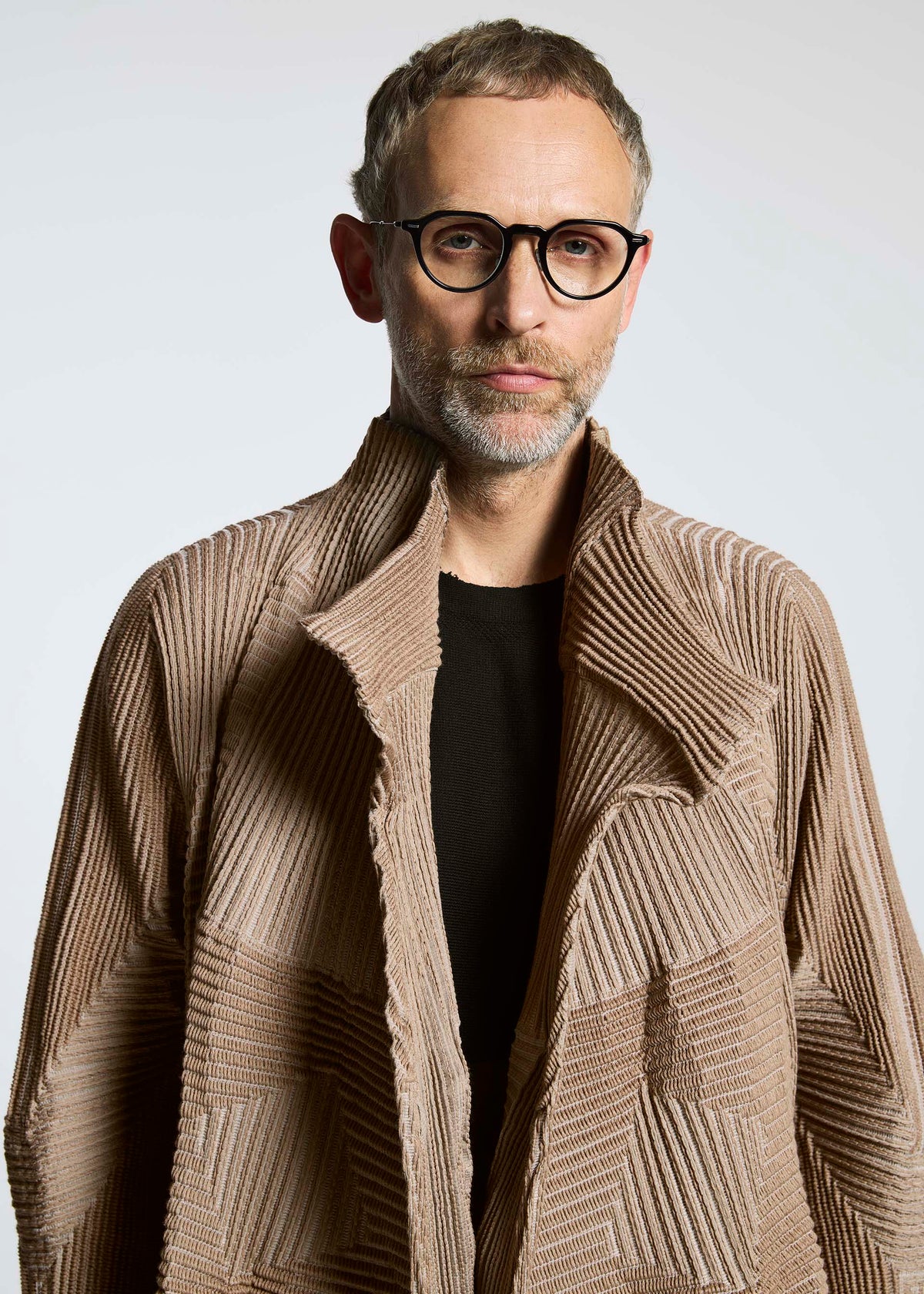 A model wears the A-POC ABLE ISSEY MIYAKE TYPE O 020 coat.