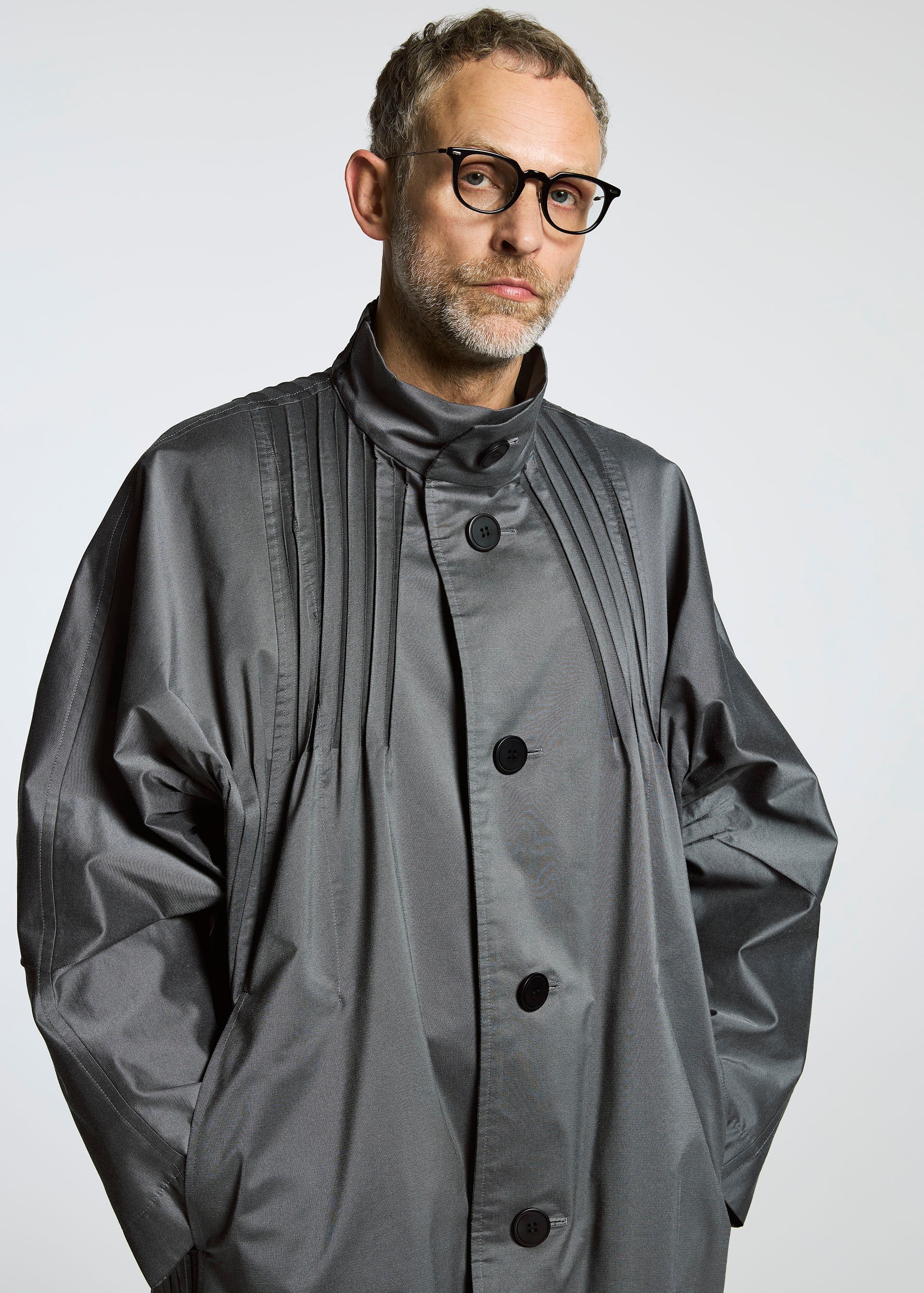 A model wears the A-POC ABLE ISSEY MIYAKE TYPE S 001 1 coat.
