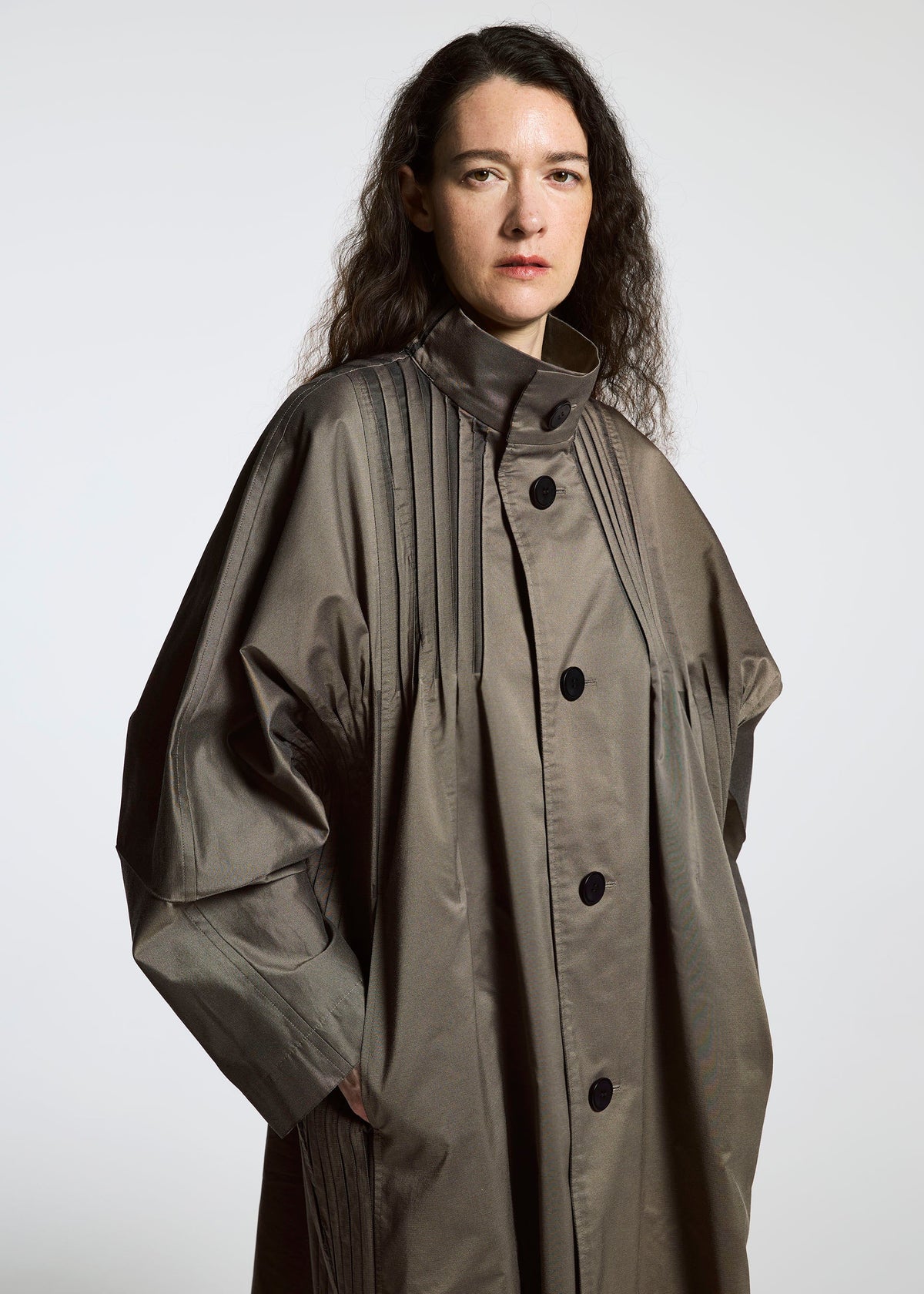A model wears the A-POC ABLE ISSEY MIYAKE TYPE S 001 1 coat.