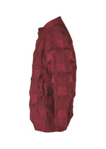 A detail shot of the A-POC ABLE ISSEY MIYAKE TYPE O 018 clothing.