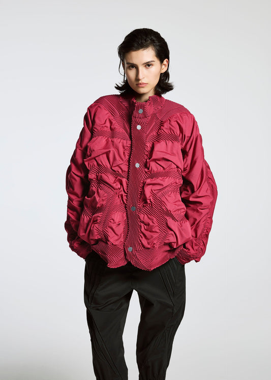 A model wears the A-POC ABLE ISSEY MIYAKE TYPE O 021 jacket.