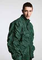 A model wears the A-POC ABLE ISSEY MIYAKE TYPE O 021 jacket.