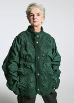 A model wears the A-POC ABLE ISSEY MIYAKE TYPE O 021 jacket.