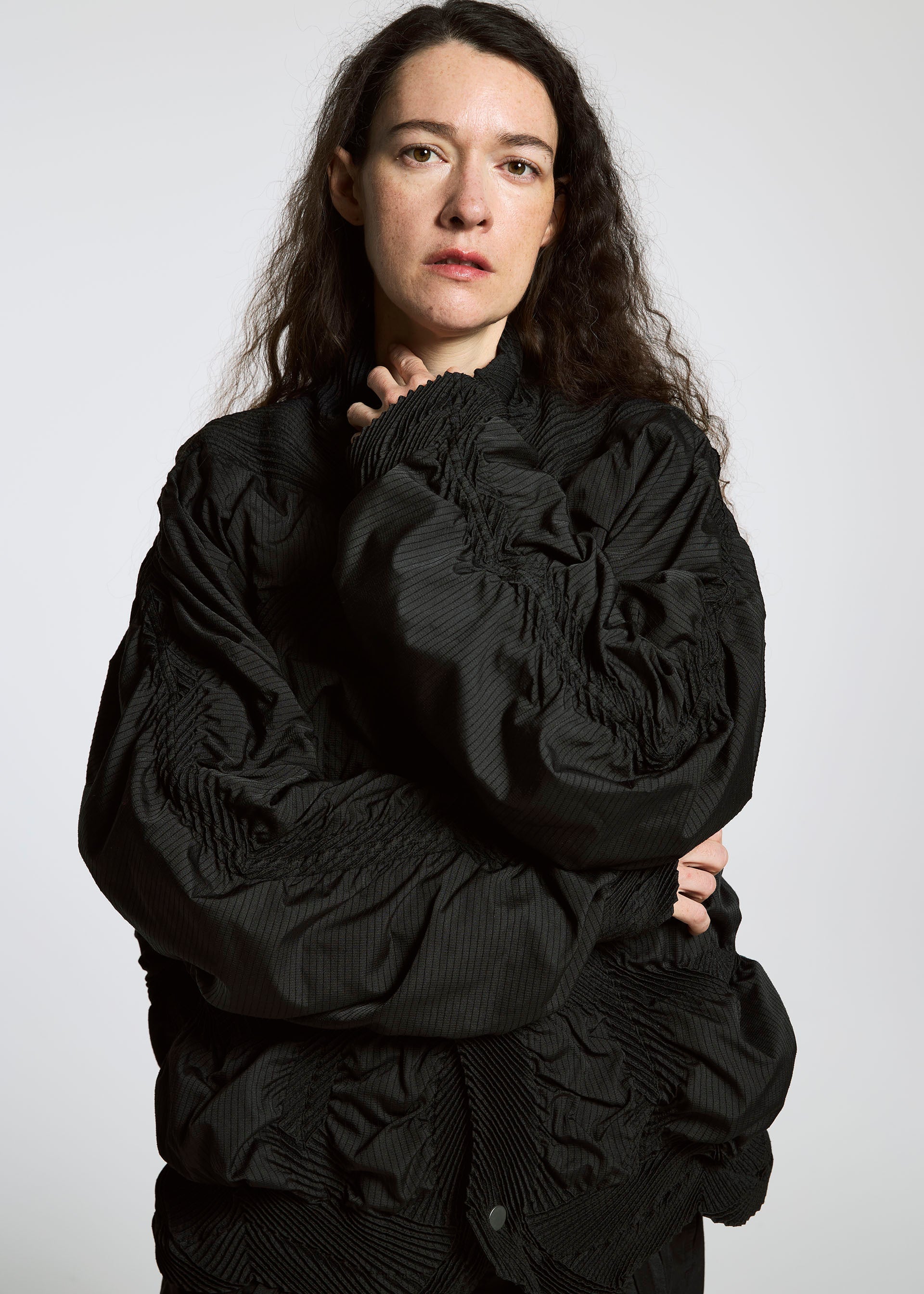 A model wears the A-POC ABLE ISSEY MIYAKE TYPE O 021 jacket.