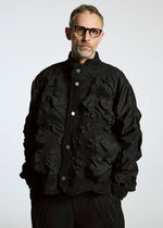 A model wears the A-POC ABLE ISSEY MIYAKE TYPE O 021 jacket.