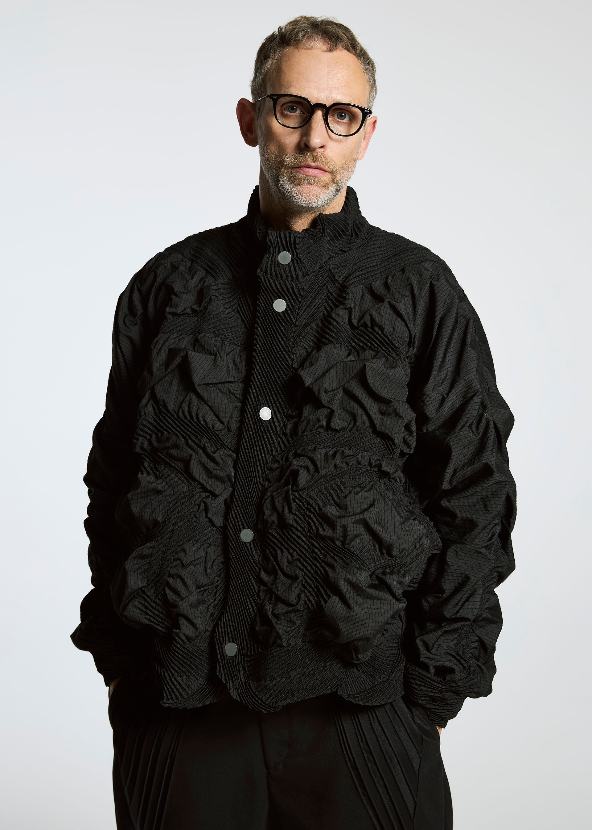 A model wears the A-POC ABLE ISSEY MIYAKE TYPE O 021 jacket.