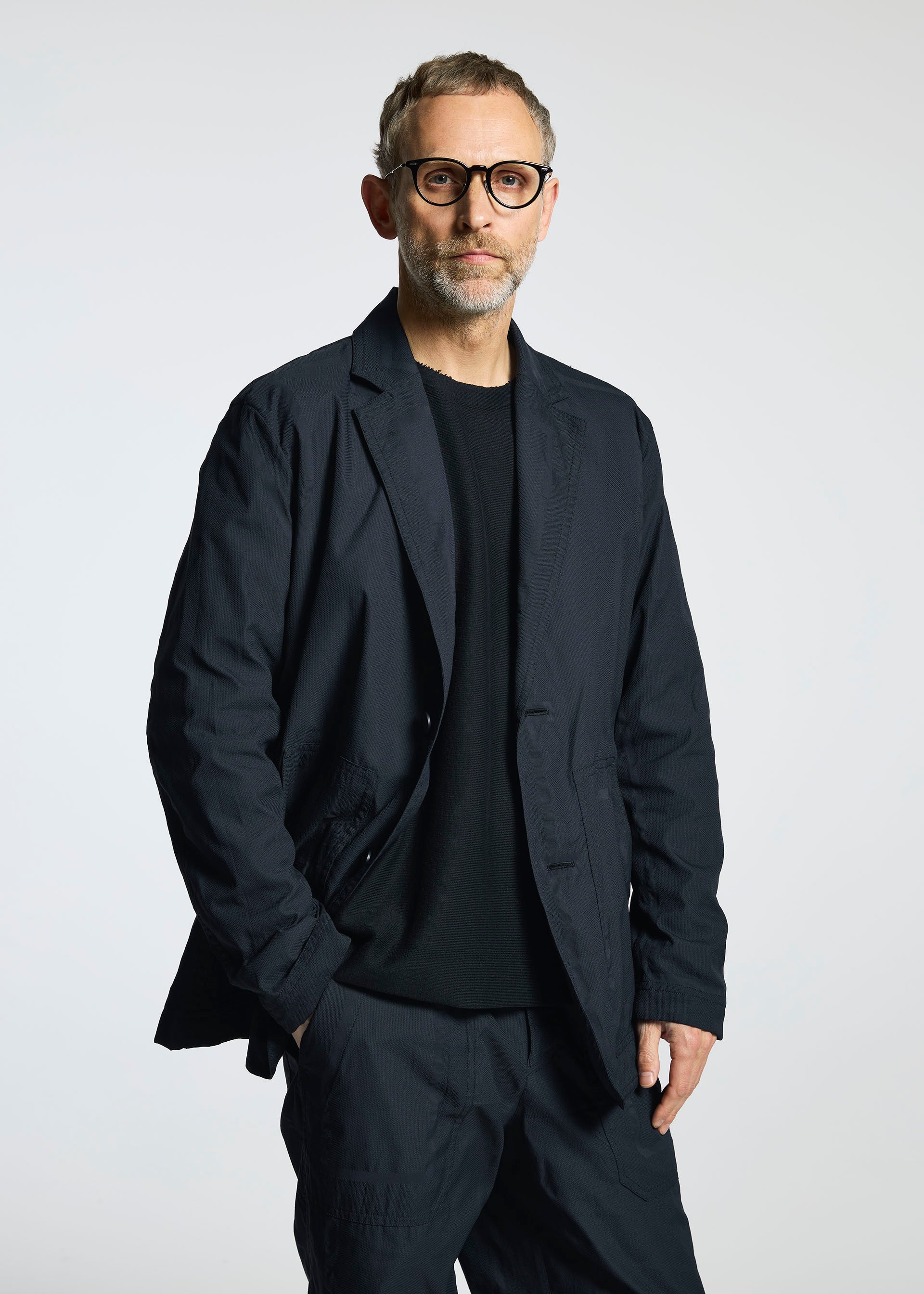 A model wears the A-POC ABLE ISSEY MIYAKE TYPE U 001 jacket.