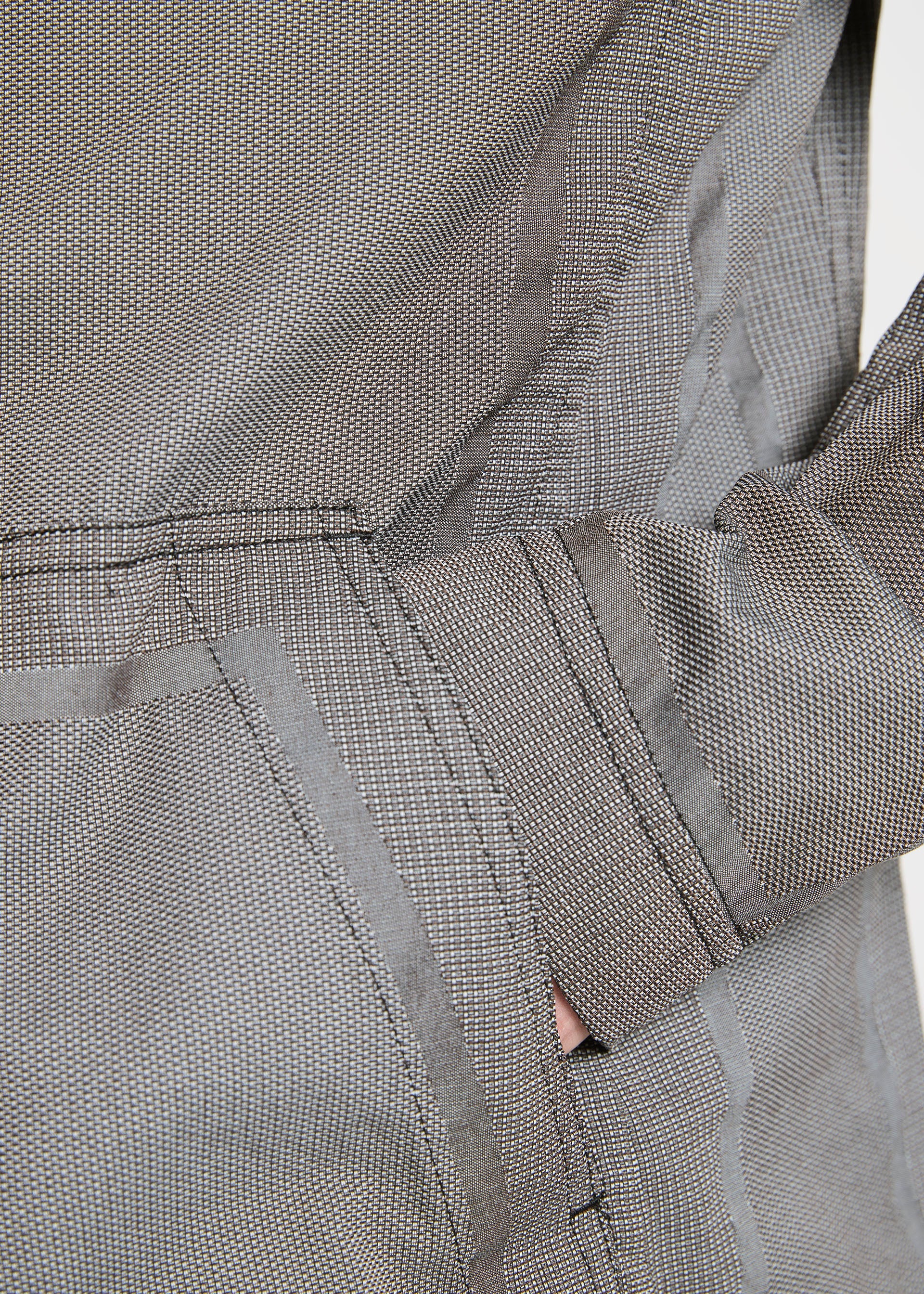 A model wears the A-POC ABLE ISSEY MIYAKE TYPE U 001 jacket.