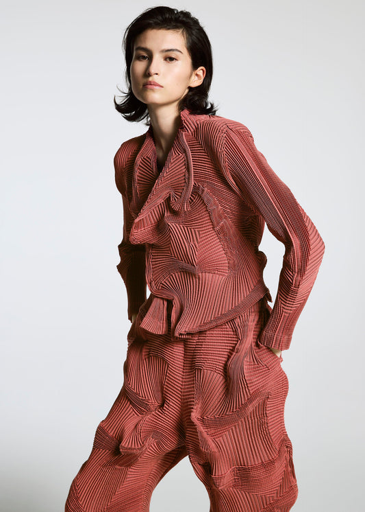 A model wears the A-POC ABLE ISSEY MIYAKE TYPE O 003 jacket.