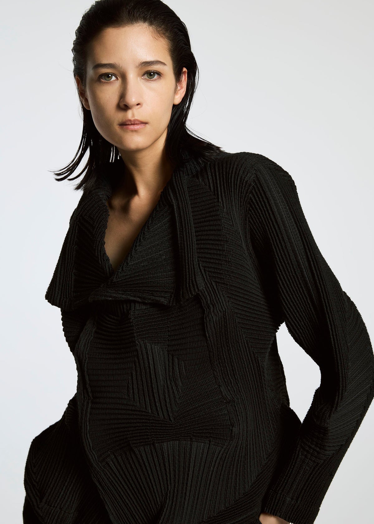 A model wears the A-POC ABLE ISSEY MIYAKE TYPE O 020 jacket.