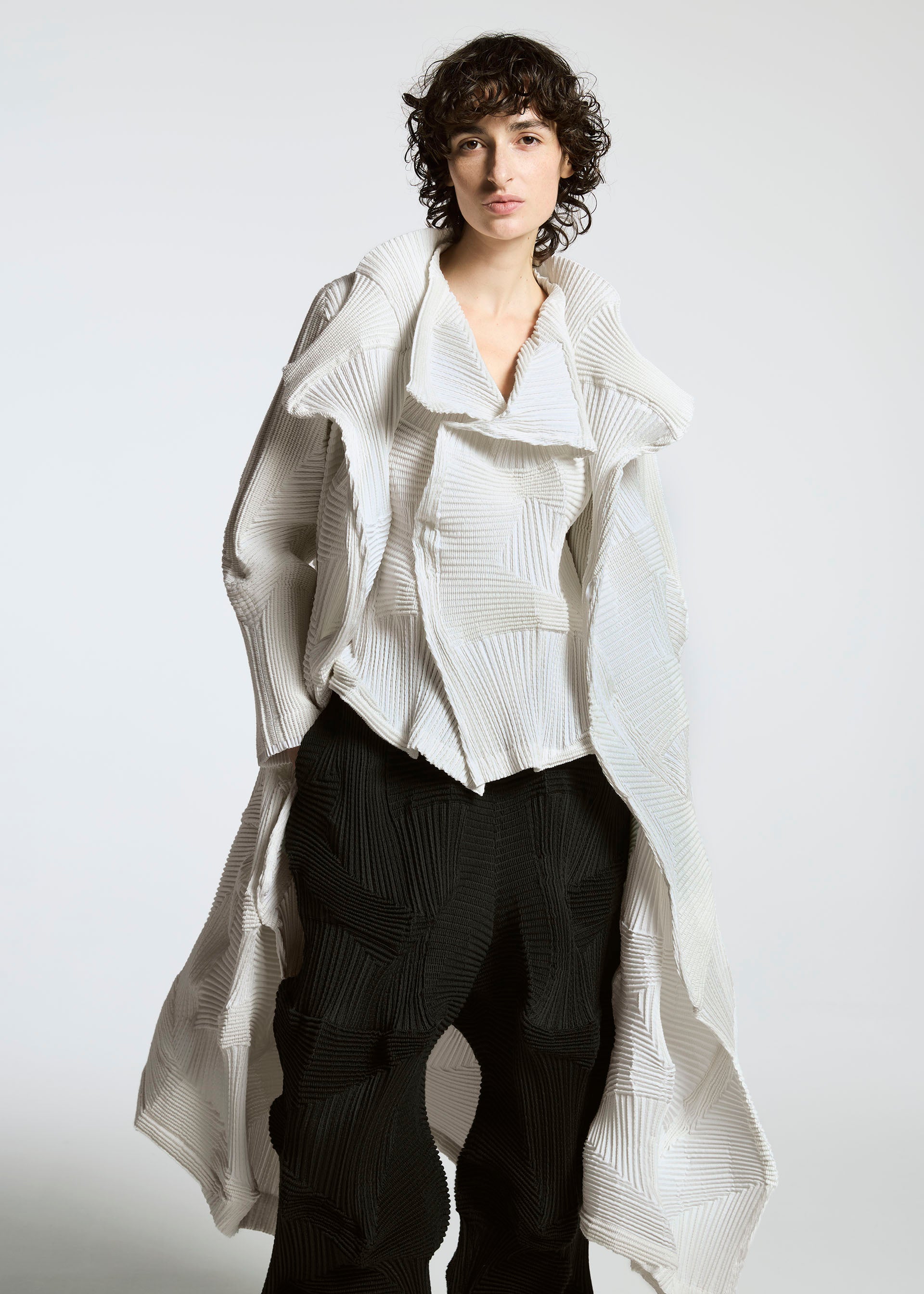 A model wears the A-POC ABLE ISSEY MIYAKE TYPE O 020 jacket.