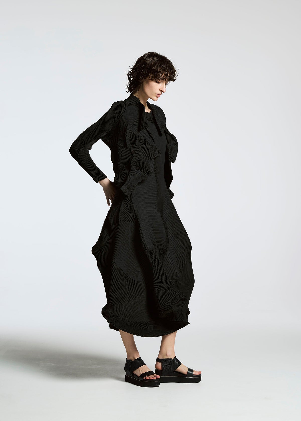 A model wears the A-POC ABLE ISSEY MIYAKE TYPE I 008 jacket.