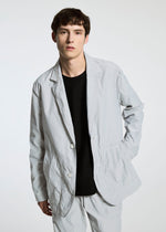 A model wears the A-POC ABLE ISSEY MIYAKE TYPE U 001 trousers.